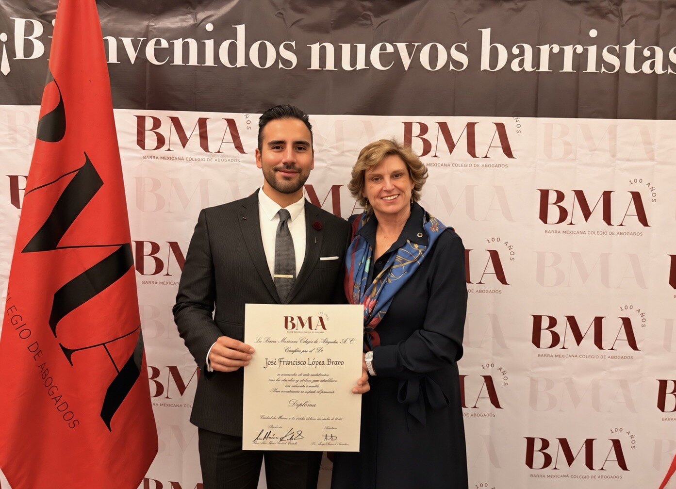 José Francisco López Bravo receives his admission diploma to Barra Mexicana, Colegio de Abogados, from Mtra. Ana María Kudisch in Mexico City